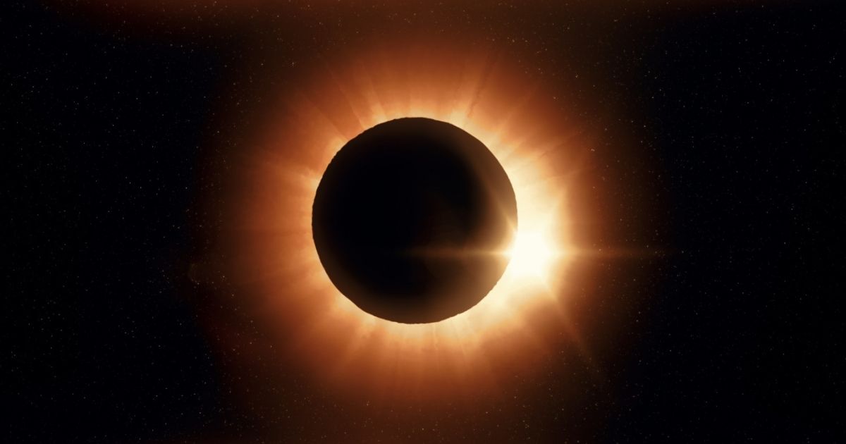Totale zonsverduistering waarbij de maan de zon volledig bedekt, met zichtbare zonnecorona en stralend licht tegen een sterrenhemel